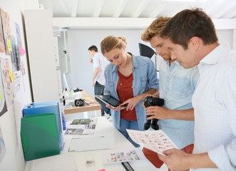 Creative team meeting in photographer's studio