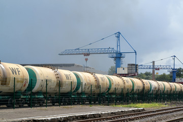 Fototapeta na wymiar Cargo structure with oil products at railway station