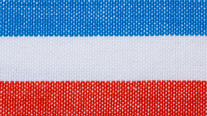 Closeup of blue red white striped textile