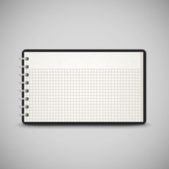 open checked notebook isolated on grey