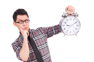 Man with clock trying to meet the deadline isolated on white