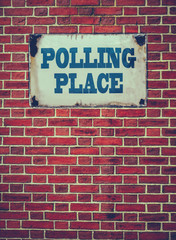 Fototapeta na wymiar Polling Place Sign On Wall