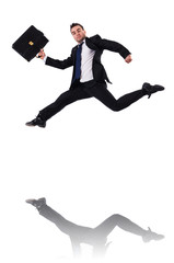 Jumping businessman isolated on the white
