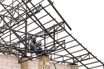 Fototapeta premium Welder at construction site