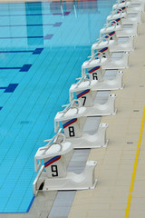 Row Of Starting Blocks At A Swimming Pool