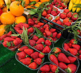 Strawberries in boxes as healthy food on sale