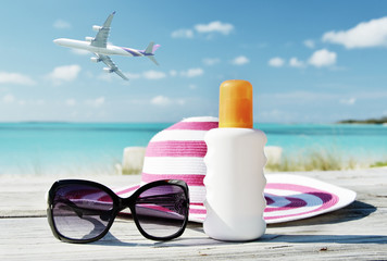 Hat, sunglasses and sun lotion. Exuma, Bahamas