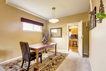 Fototapeta premium Dining wooden table with leather chair