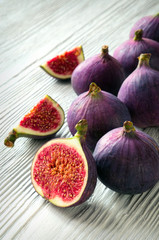 Portion of fresh Figs on wooden background