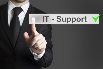 businessman pushing button it support
