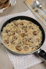 Fried mushrooms in a creamy sauce