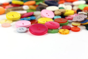 Coloured haberdashery buttons with copy space