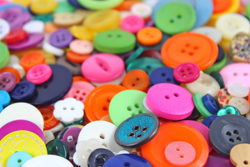 Haberdashery buttons, brightly coloured.