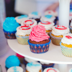 Beautiful multicolored decorated baked sweet tasty cupcake