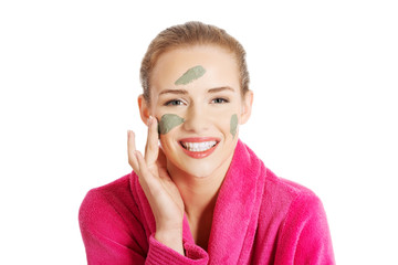 Relaxed woman with a nourishing face mask