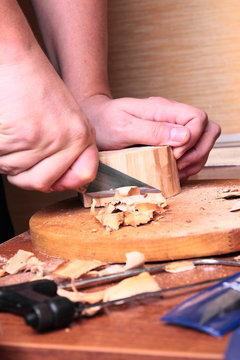 carpenter hand carving wood