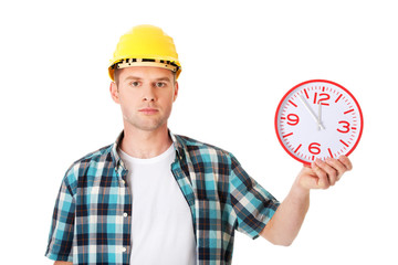 Businessman wearing helmet with clock