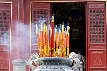 Ritual candles in front of the Shaolin Temple entrance - 70370059