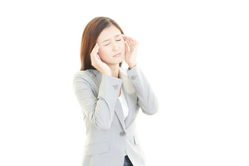 Fototapeta premium 頭痛に悩むＯＬ