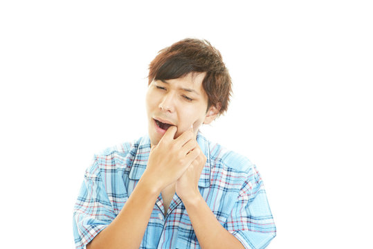 歯痛を訴える男性