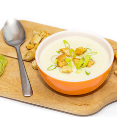 Bowl of Leek and Potato soup with croutons