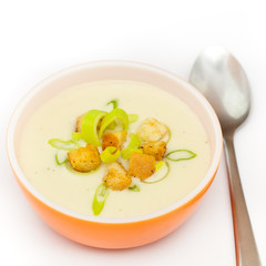 Bowl of Leek and Potato soup with croutons