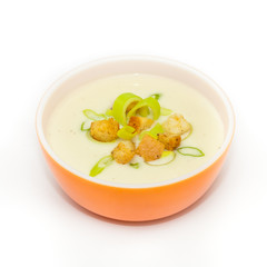 Bowl of Leek and Potato soup with croutons