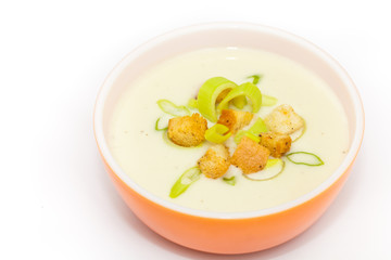 Bowl of Leek and Potato soup with croutons