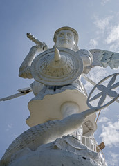 Obraz premium Frontal and low view of a statue of Saint Michael