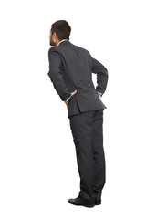 Obraz na płótnie Canvas back view of businessman in black suit