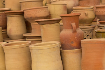 Fototapeta na wymiar Handmade moroccan clay dishware in a pottery factory
