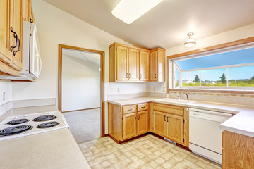 Countryside house interior. Kitchen room with vaulted ceilign an