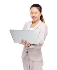 Asian businesswoman use of notebook computer