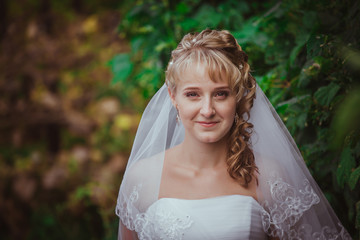 Portrait of a beautiful smiling bride