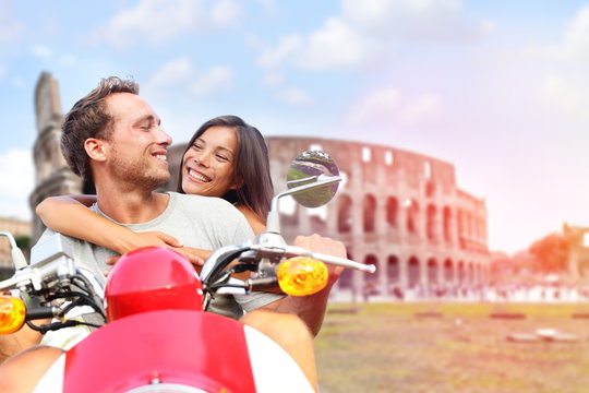 Italy Rome Couple On Scooter By Colosseum