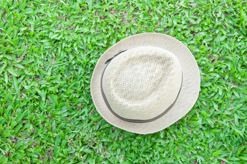 hat on grass
