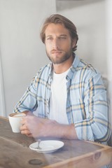 Casual man having a coffee