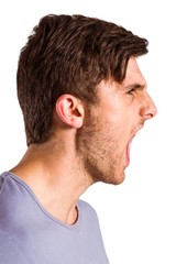 Obraz premium Angry young man with stubble shouting
