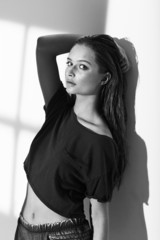 Black and white portrait of cool teenage girl.