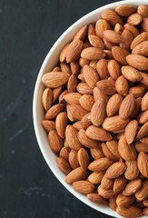 almond nuts in white bowl