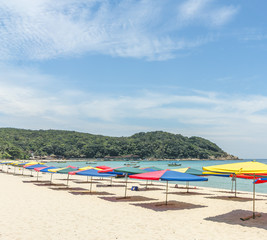 Tropical beach with shade umbrella