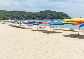 Fototapeta na wymiar Tropical beach with shade umbrella