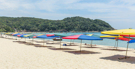 Tropical beach with shade umbrella