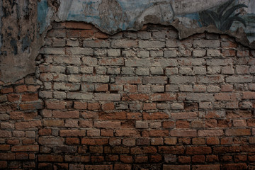 Cracked old concrete vintage brick wall background.