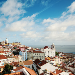Beautiful view of old city from Alfama with cloudy sky. Lisbon,