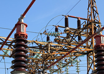 insulators and electric cables in a large power plant