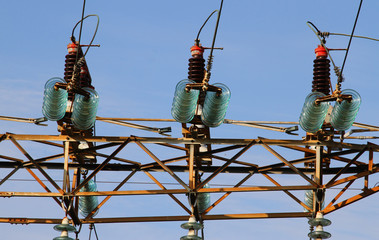 power plant with tall pylons of high voltage cables