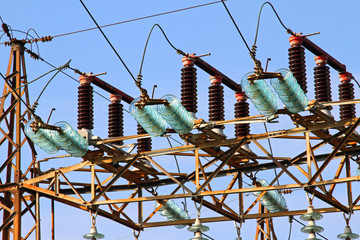 great insulators in a power plant with tall pylons of high volta