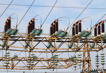 insulators in a power plant with high voltage cables