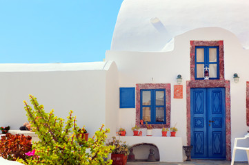 Traditional Greek house with blue door, Santorini, Greece